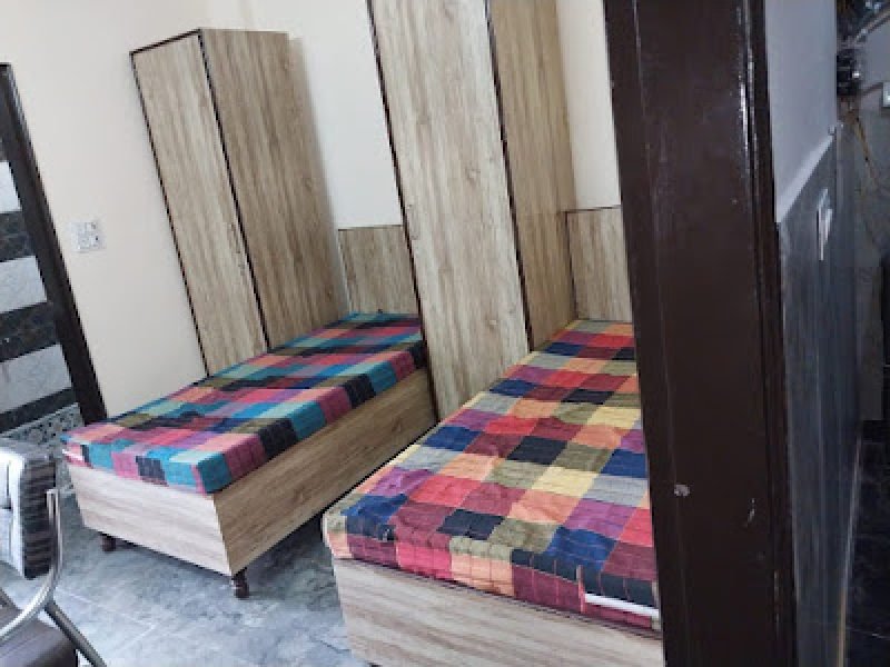 AC Double Sharing Govindam Niwas Primestay
